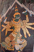 Bangkok Grand Palace, murals of the gallery of the Wat Phra Kaew, Totsakan, the ten-headed demon king from the Ramakien, he has a green complexion and multiple arms. 